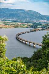 The Servia High Bridge, as viewed from the village of Neraida, at the Polyfytos artificial lake in Macedonia, Greece - 784569706