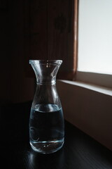 glass vase on a wooden table