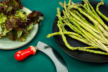 Fresh raw asparagus. - 784573504