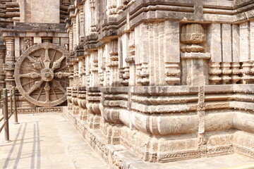 Fototapeta premium Sun Temple of Konark. Oldest temple in India. Beautiful sculpture of ancient India 13th century. Wall mounting background. Wall poster. Historical place for travelers. Destination place. 