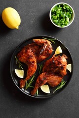 Grilled half chicken with lemon and rosemary