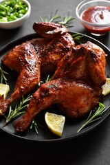 Grilled half chicken with lemon and rosemary