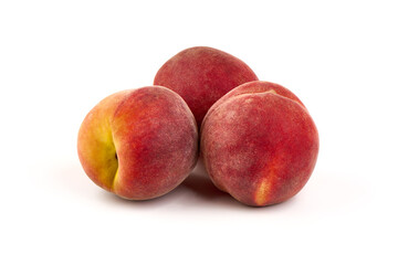 Fresh peaches, isolated on white background.