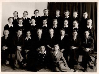 Chasov Yar, USSR, Ukraine - 05.19.1956: Retro photo of a group of Soviet school graduates. Vintage.