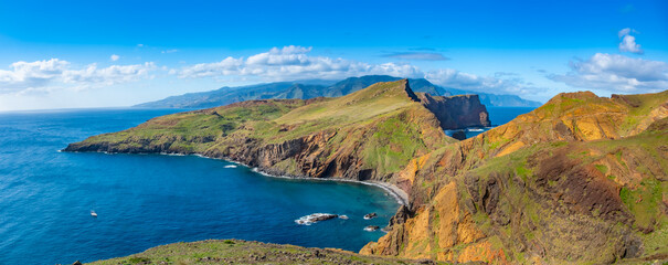 Ponta de Sao Lourenco Madeira Portugal. Scenic mountain view of green landscape, cliffs and Atlantic Ocean. Hiking active day, travel background