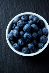 Bilberries on dark background. Close up.	