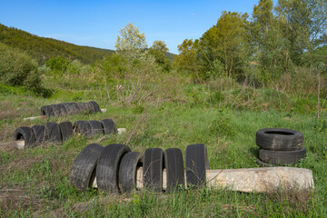 Used rubber wheels in the outdoors - 784588136