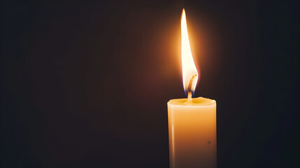 white slim burning candle on black background