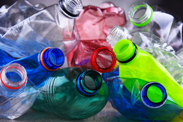 Empty colored carbonated drink bottles. Plastic waste - 784590747