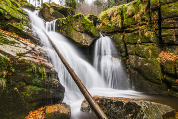 Fototapeta na wymiar Autumn waterfall in the Jizera Mountains