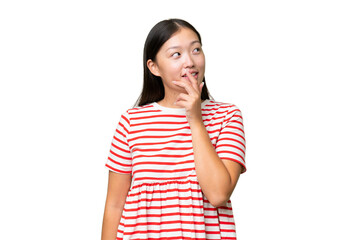 Young Asian woman over isolated background with an expression of frustration and not understanding