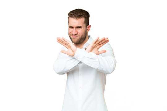 Young handsome blonde man over isolated chroma key background nervous stretching hands to the front