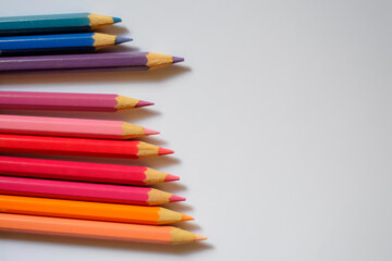 Beautiful colour pencils use as background with copy space. Color pencils isolated on white...