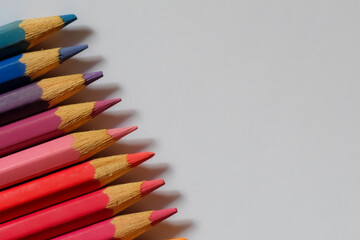 Obraz premium Beautiful colour pencils use as background with copy space. Color pencils isolated on white background close up with Clipping path.