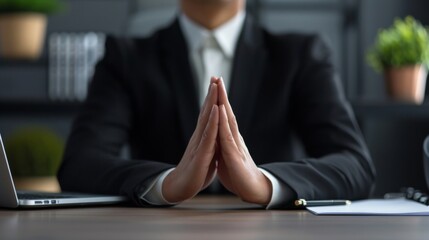 Executive with Steepled Hands