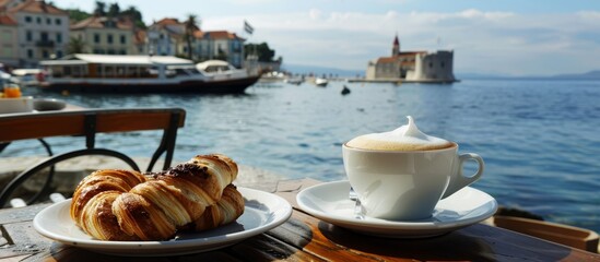 Espresso and pastries are enjoyed leisurely, following Croatian cafe traditions by the sea.  - obrazy, fototapety, plakaty