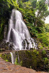 Waterfall in Parque Natural da Ribeira dos Caldeiroes in Sao Miguel Island, Azores - 784634333