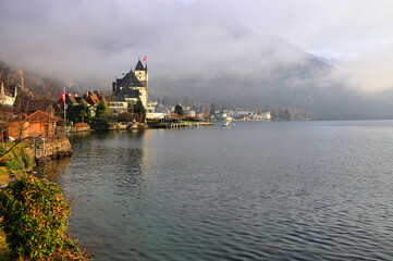 City of Vitznau on beautiful Lake Lucerne in the fog. Switzerland, Europe.
