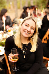 Woman with wineglasses during banquet
