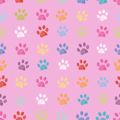 Pink background and dots with colorful paw prints. Seamless fabric design pattern