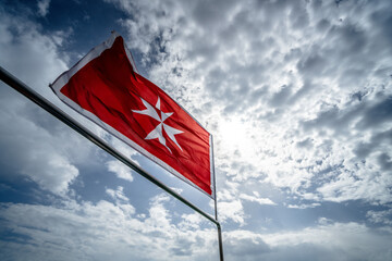 Malta flag in the wind. Sunny day - 784657720
