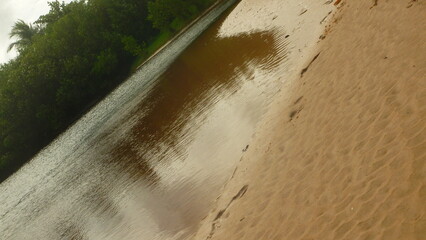 abstract and minimalist landscape with reflections in the water