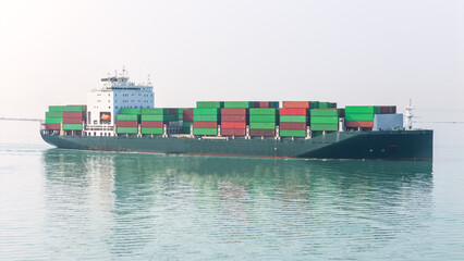 Cargo container Ship, cargo maritime ship with contrail in the ocean ship carrying container and running for export concept technology freight shipping sea freight by Express Ship