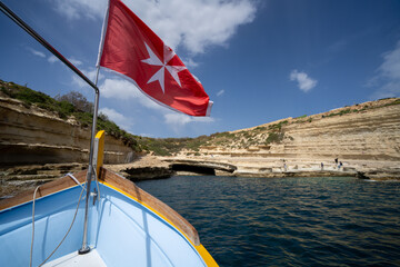Malta flag in the wind. Sunny day - 784657987