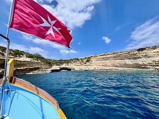 Malta flag in the wind. Sunny day - 784658586
