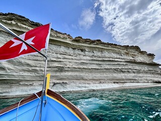 Malta flag in the wind. Sunny day - 784658716