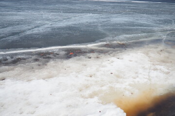 Ice drift in spring on Lake Onega, Karelia. Dangerous thin spring ice in April. Aggregate...
