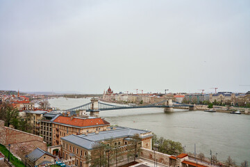 Panoramic view on skyline of Budapest city with Chain Bridge along Danube River. Architecture of capital of Hungary with historical buildings and famous landmarks