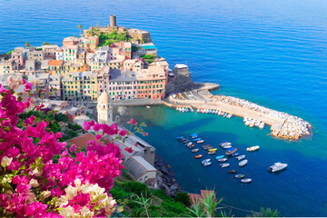 Vernazza pituresque town of Cinque Terre, Italy, view from above with flowers