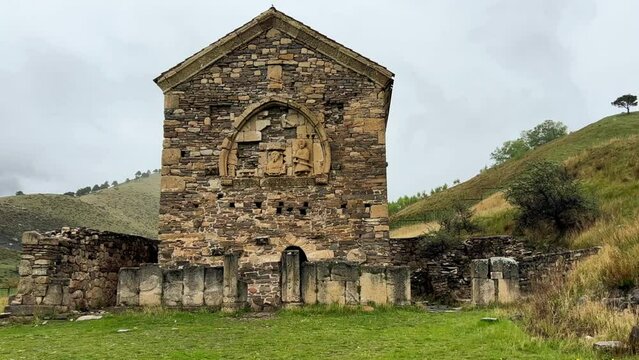 Thaba-Yerdy in Ingushetia. ZEISS, RUSSIA - MAY 19, 2023: Video of the Thaba-Yerdy Temple, the oldest temple in Ingushetia. The Caucasus Mountains. 4K	