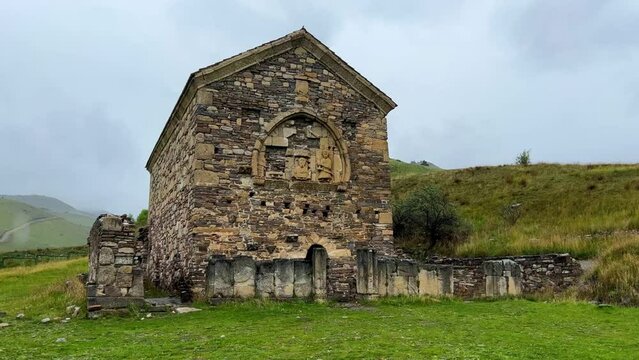 Thaba-Yerdy in Ingushetia. ZEISS, RUSSIA - MAY 19, 2023: Video of the Thaba-Yerdy Temple, the oldest temple in Ingushetia. The Caucasus Mountains. 4K