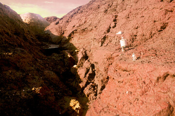 Martian base diorama whith astronauts exploring Mars on a natural landscape
