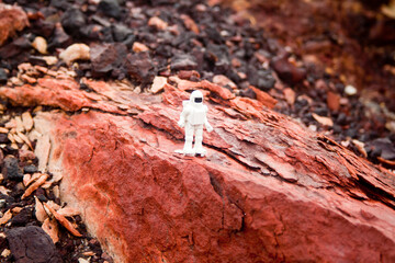 Astronaut over martian soil