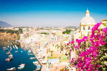 Procida island harbour details, colorful town with harbour and flowers, Italy