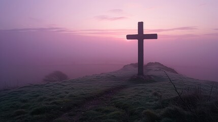 Easter's cross on a hill, framed by the soft hues of dawn, inviting reflection and peace