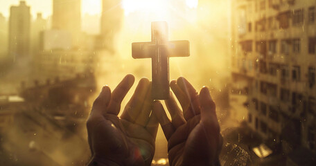 Hands Framing Cross Silhouette with Urban Sunrise
