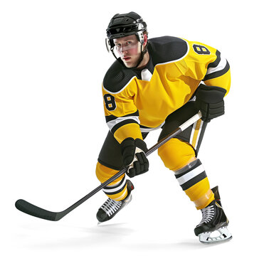 Ice hockey player in yellow jersey in active pose, isolated background
