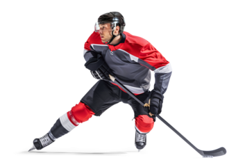 Active ice hockey player in action pose on isolated background