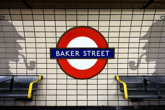 Baker Street London Underground station roundel and silhouette motifs of Sherlock Holmes on the platform