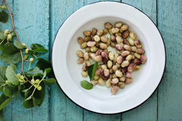 Delicious sweet white mulberry in a bowl