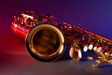 Alto Saxophone looking towards Bell with Colorful Red and Blue Jazzy Lighting