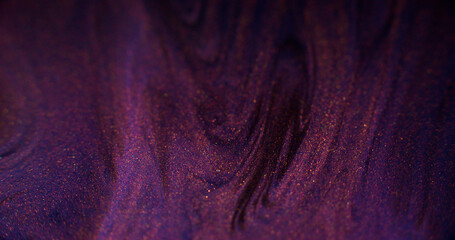 Shiny liquid. Wet glitter texture. Blur purple pink color metallic shimmering sand particles paint liquid ink pigment emulsion flow galaxy glow abstract art background.