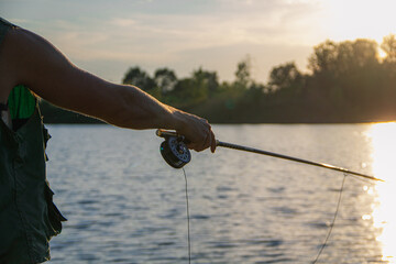 Fisherman pole over lake