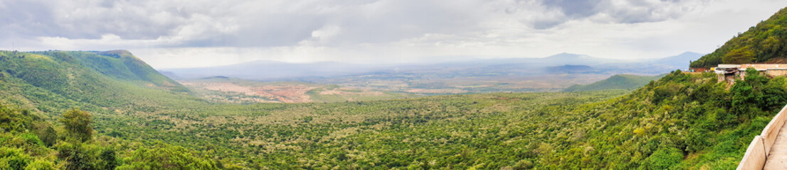Magnificent wide angle panorama view of the Great African Rift Valley with Mount Suswa on the left and Mount Longonot on the right as seen from the edge of the escarpment near Nairobi, Kenya,Africa