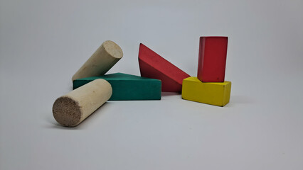 wooden blocks stacked on a white background, children's educational toys