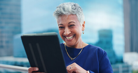 Mature, woman and laughing with tablet for business outdoor in city with corporate meme or social...